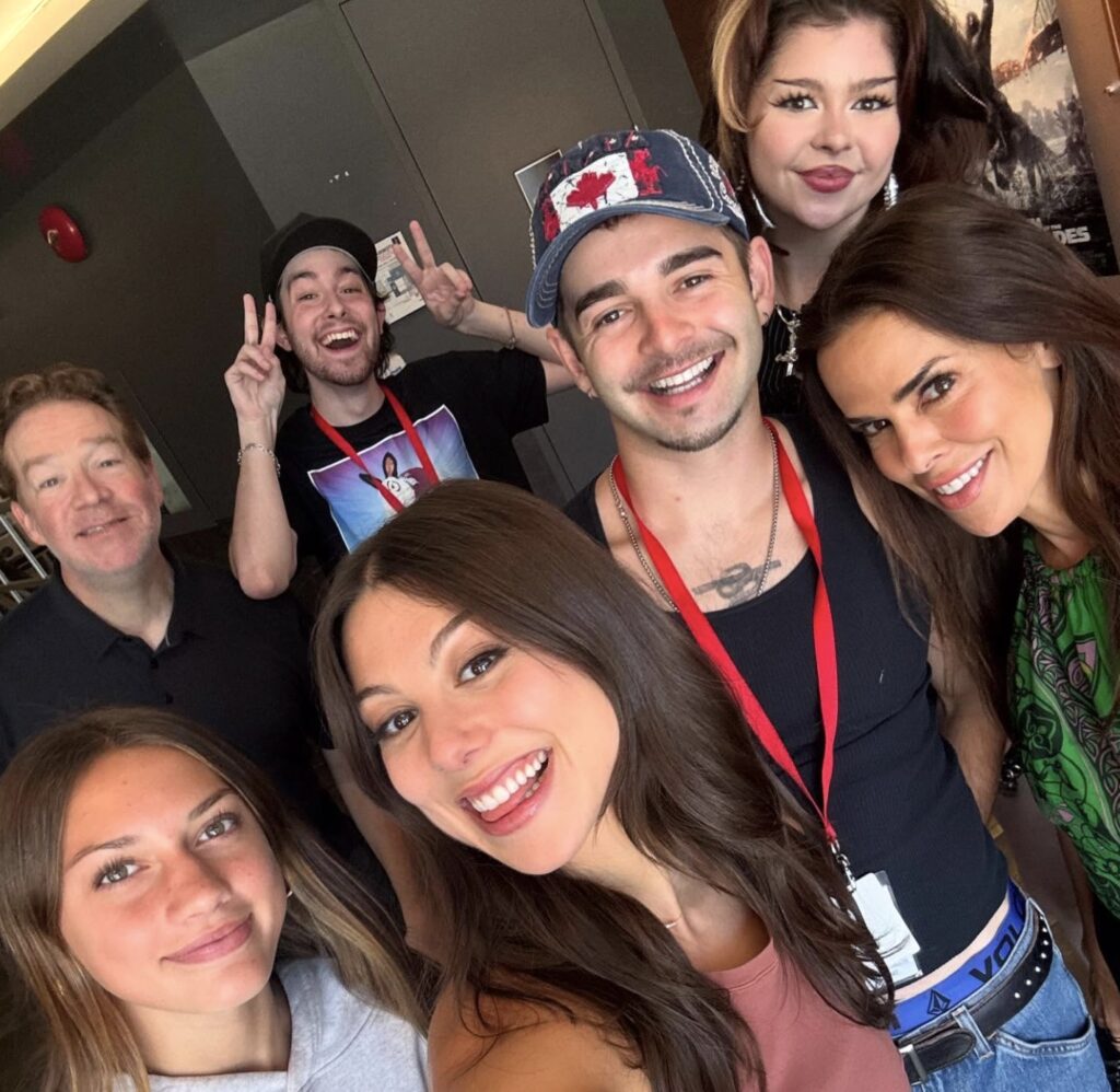 The original cast smiles for a selfie on the set of 2026's Clash of the Thundermans